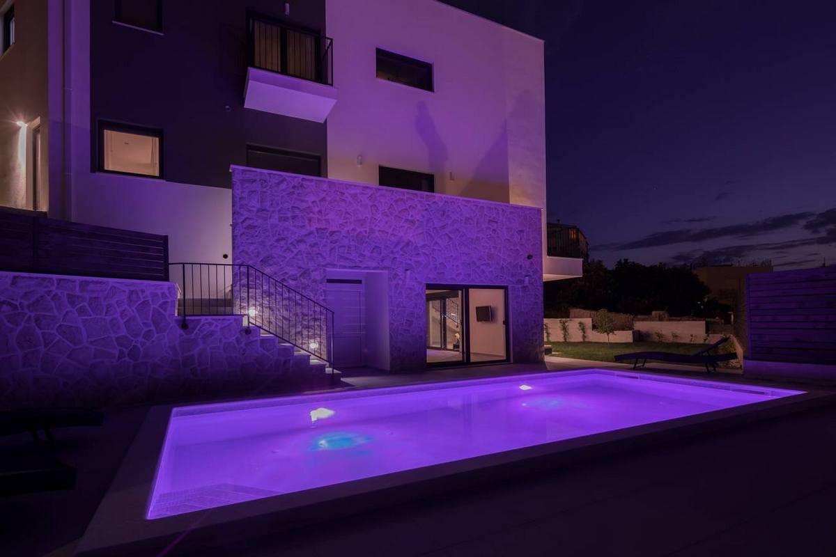 Villa Salt pool at night in violet
